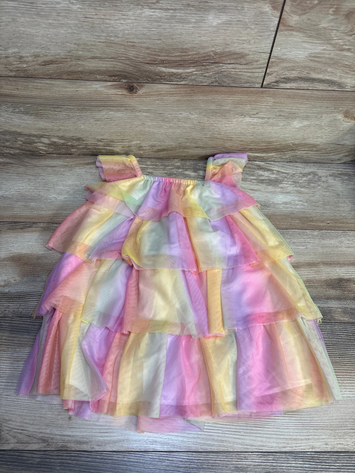 Pastel rainbow tulle dress for toddler girl, layered ruffles, soft colors, kids clothing