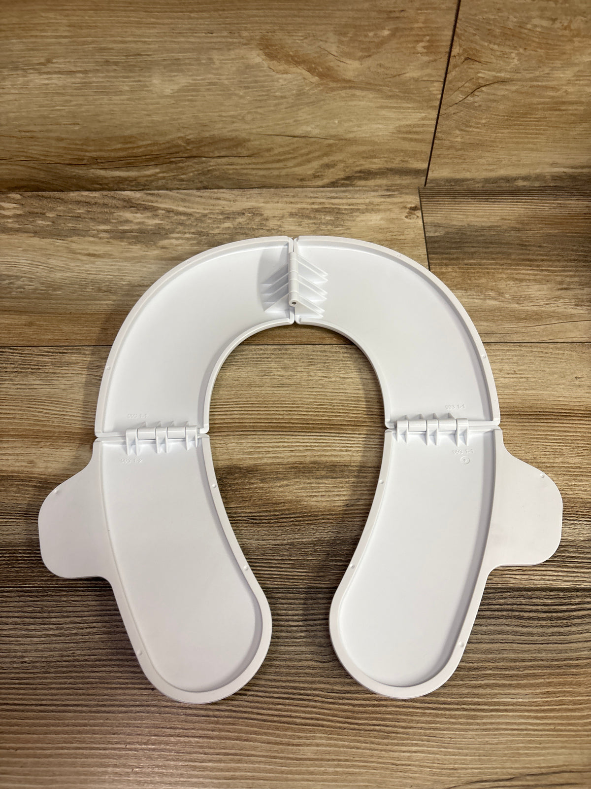 Frida Baby Fold-And-Go Potty Seat - White