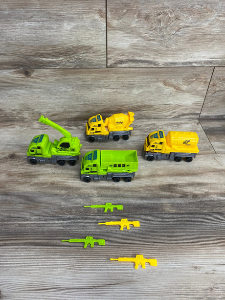 Set of green and yellow toy construction trucks and matching toy rifles on wood floor