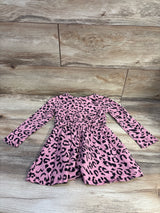 Front view of Amazon Essentials pink leopard-print dress with long sleeves and gathered waist, size 4T, on wood-look floor