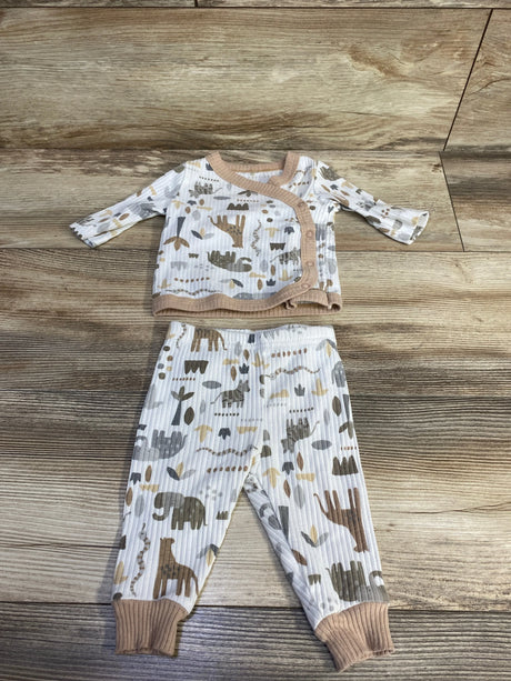 Flat lay of newborn ribbed kimono pajama set (0-3M) showing tan trim and beige-gray animal print on wood background