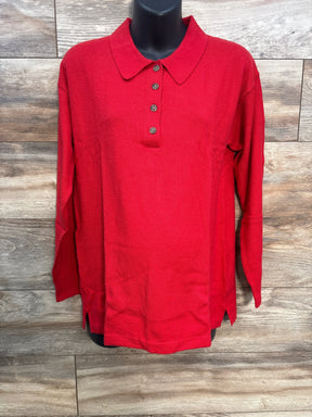 Red long sleeve polo shirt with buttons, displayed on mannequin against wood background