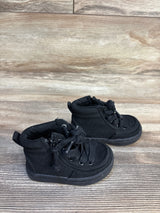 Black toddler sneakers with laces on wood floor, gently used kids shoes