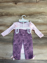 Pink Minnie Mouse baby outfit with ruffled top and purple printed pants on hanger