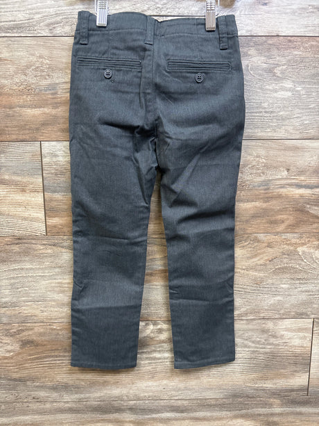 Back view of grey Gap Kids uniform stretch straight pants in size 5T on a wood background.