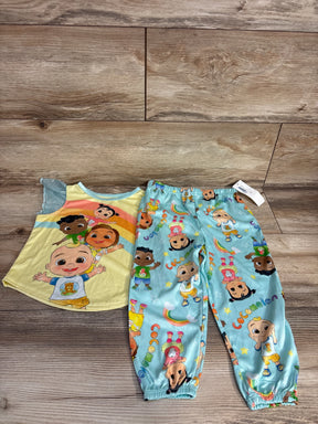 Cocomelon kids pajama set with yellow top featuring characters and rainbow and light blue pants with character print