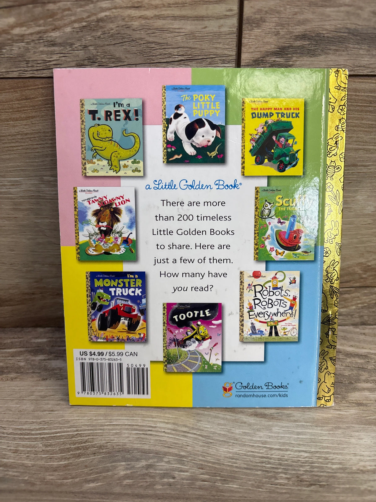 Back of A Little Golden Book I'm a Truck hardcover showcasing back-cover thumbnails and barcode with wood surface background