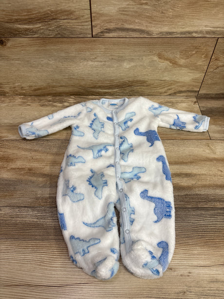 Front view of Bon Bebe plush sleeper showcasing blue dinosaur print, snap closure, and footed design on a wood floor