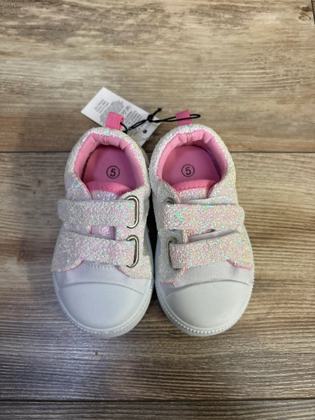 Top view of Bocca canvas walking sneakers showcasing glittery white uppers, pink lining, and double straps on wood