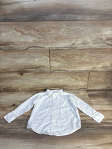 White long sleeve button-down shirt for kids on wood floor, kids clothing resale