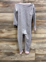 Back view of Penelope Mack leopard-print blanket sleeper (3T) showing long sleeves, pink cuffs and rear tail on wood background