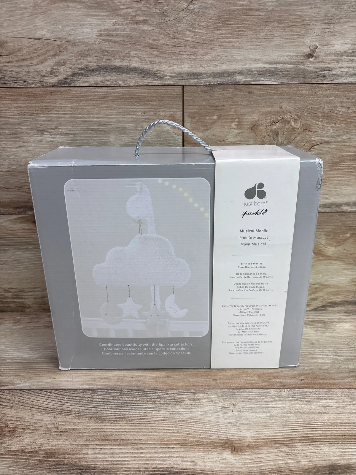 Packaging for a Me n Mommy To Be Just Born Musical Mobile in Sparkly Gray Stars.