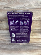 Philips Avent baby bottle and bottle warmer set packaging on wood floor, product details visible.