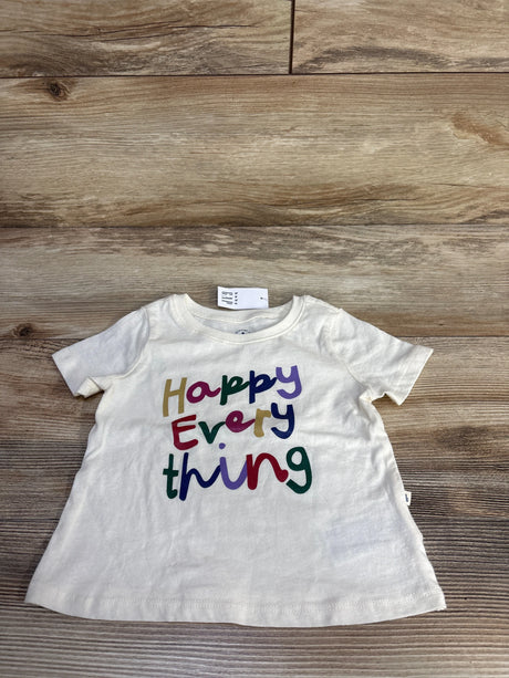 Front view of Baby Gap ivory short-sleeve tee 6-12M showcasing multicolored Happy Everything text on wood background