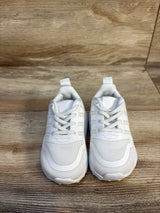 Top-front view of Adidas Multix Triple White sneakers size 4C showcasing mesh upper, laces and three stripes on wooden floor