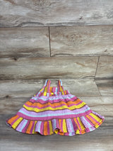 Flat lay of Cat and Jack muslin tank dress (18M) showing multicolor stripes and ruffle hem on wood floor background