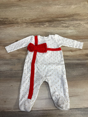 White polka dot baby onesie with red bow and stripe, perfect for newborns and infants.