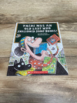 There Was an Old Lady Who Swallowed Some Books! Paperback By Lucille Colandro