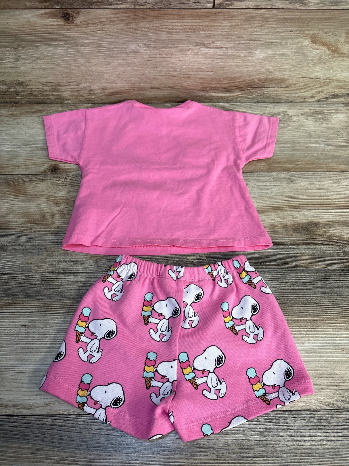 Pink Snoopy kids outfit with ice cream print shorts and tee, perfect for summer play