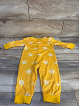 Flat-lay back view of yellow snap jumpsuit size 9-12 months showing white sun print and ribbed cuffs on wood background