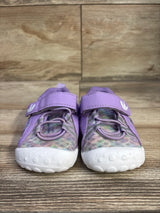 Front view of FEETCITY barefoot water shoes, purple size 4/5C, showing bungee laces, velcro strap, white textured toe on wood