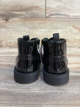 Black patent leather baby boots with platform soles and back pull tabs, perfect for toddler fashion.