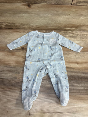 Light blue baby sleeper with cartoon mouse print, footed, long sleeves, laid on wood floor