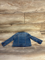 Back view of Cat and Jack denim jacket 18M showing stitched paneling, button cuffs and faded blue wash on wood background