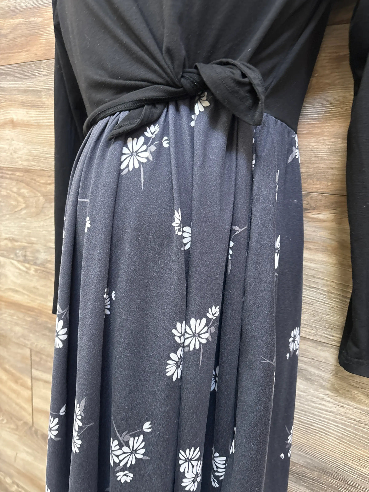 Liu & Qu Maternity Long Sleeve Nursing Dress in black with floral print skirt and waist tie