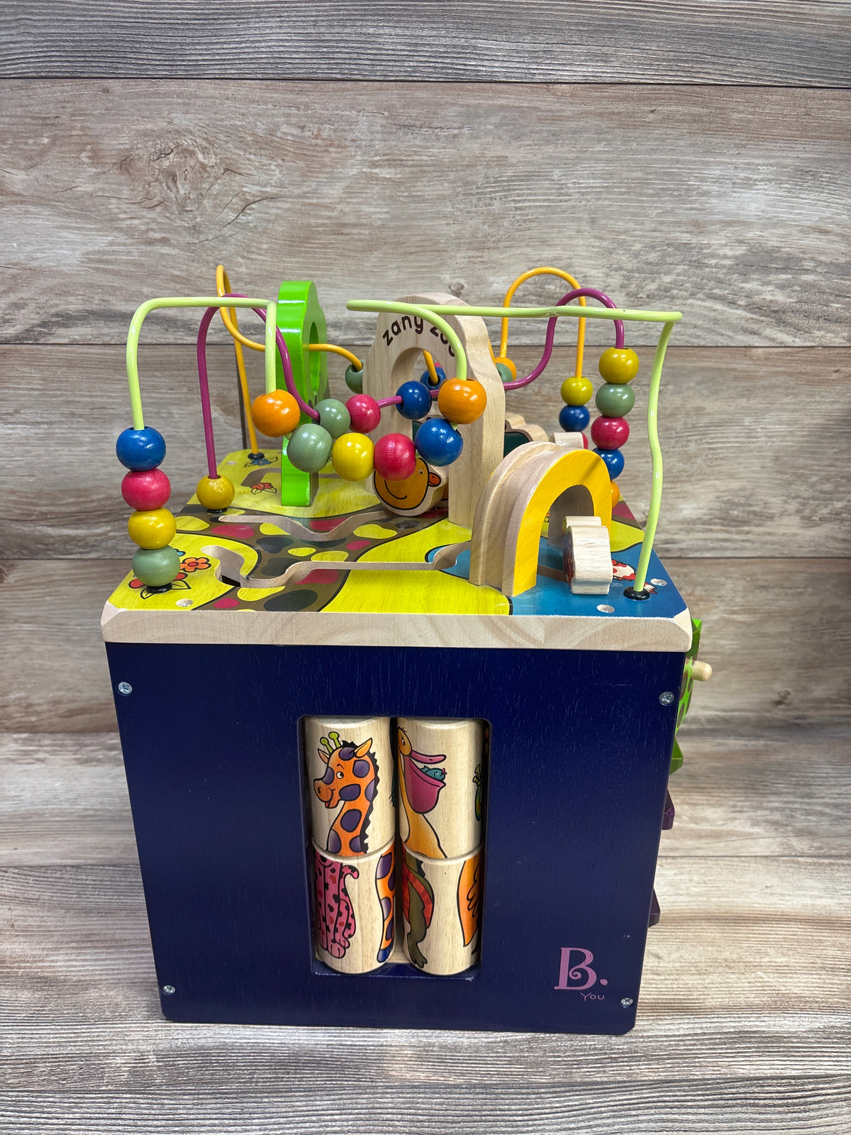 B. toys Zany Zoo Wooden Activity Cube
