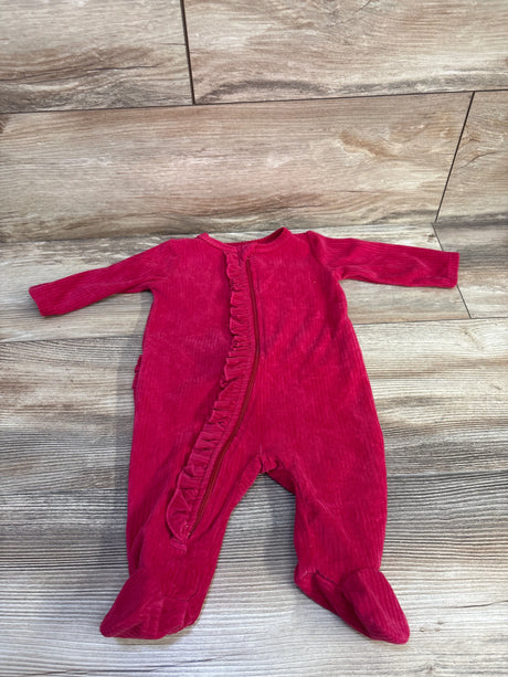 Flat lay of red Koala Baby ribbed velvet sleeper showing front zipper with ruffle trim and footed legs on wood floor