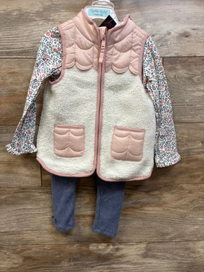 Front view of Cynthia Rowley 3-piece toddler set showcasing pink sherpa vest, floral shirt, and ribbed pants on wood