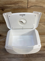 White baby wipe warmer with open lid on wood surface, ideal for nursery or diaper changing station