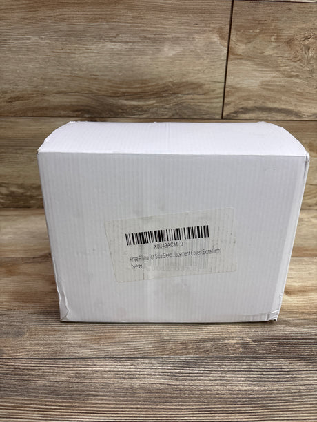 Front view of Bourn Free 3NT knee pillow box showcasing side-sleeper pillow and cover label on a wood floor