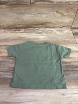 Back view of a Zeeman solid green short sleeve pocket shirt for infants, size 3-6m.