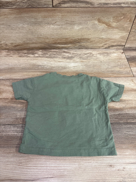 Back view of a Zeeman solid green short sleeve pocket shirt for infants, size 3-6m.