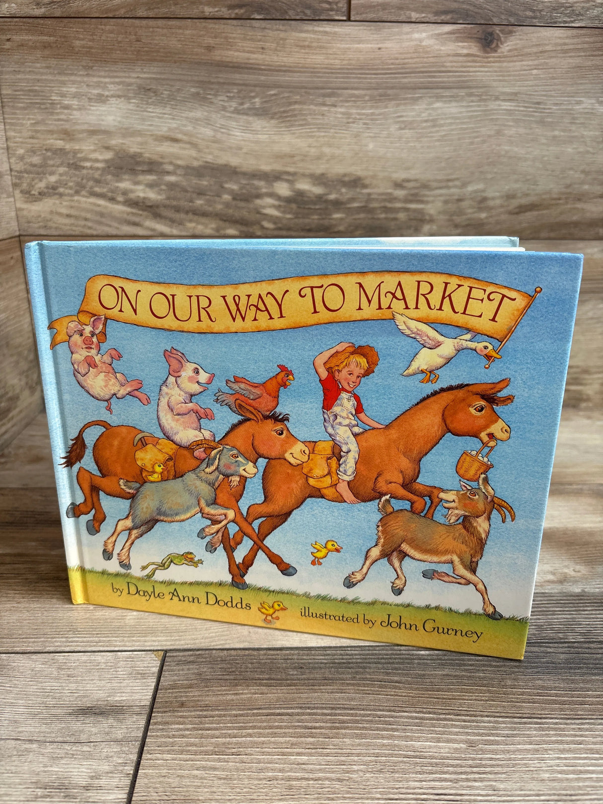 On Our Way to Market Hardcover Book
