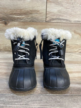 Black toddler winter boots with faux fur lining and rubber soles on wood floor