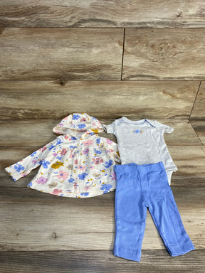 Toddler girl floral hooded jacket, gray bodysuit, and blue leggings set on wood background