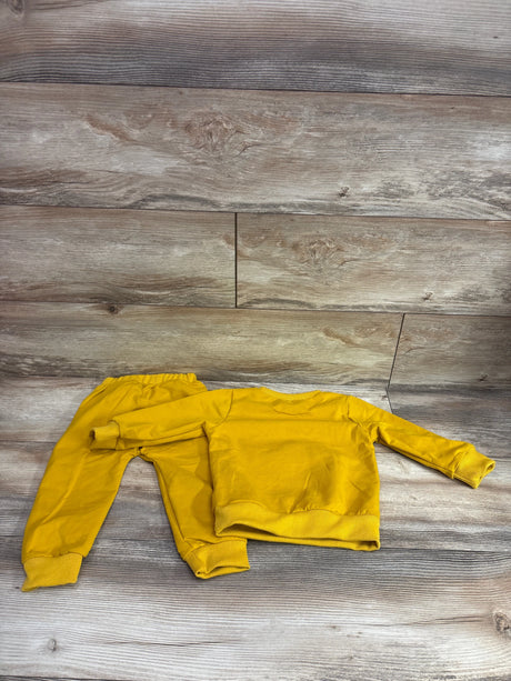 MAHUAOYIXI 2pc yellow sweatshirt and pants set for toddlers on a wood grain background