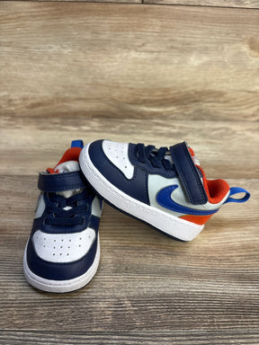 Side/front view of Nike Court Borough Low Recraft sneakers sz 4C in midnight navy, white and orange with Velcro strap and blue Swoosh