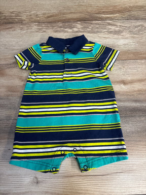 Striped short sleeve baby romper with collar, blue, green and yellow, laid on wood
