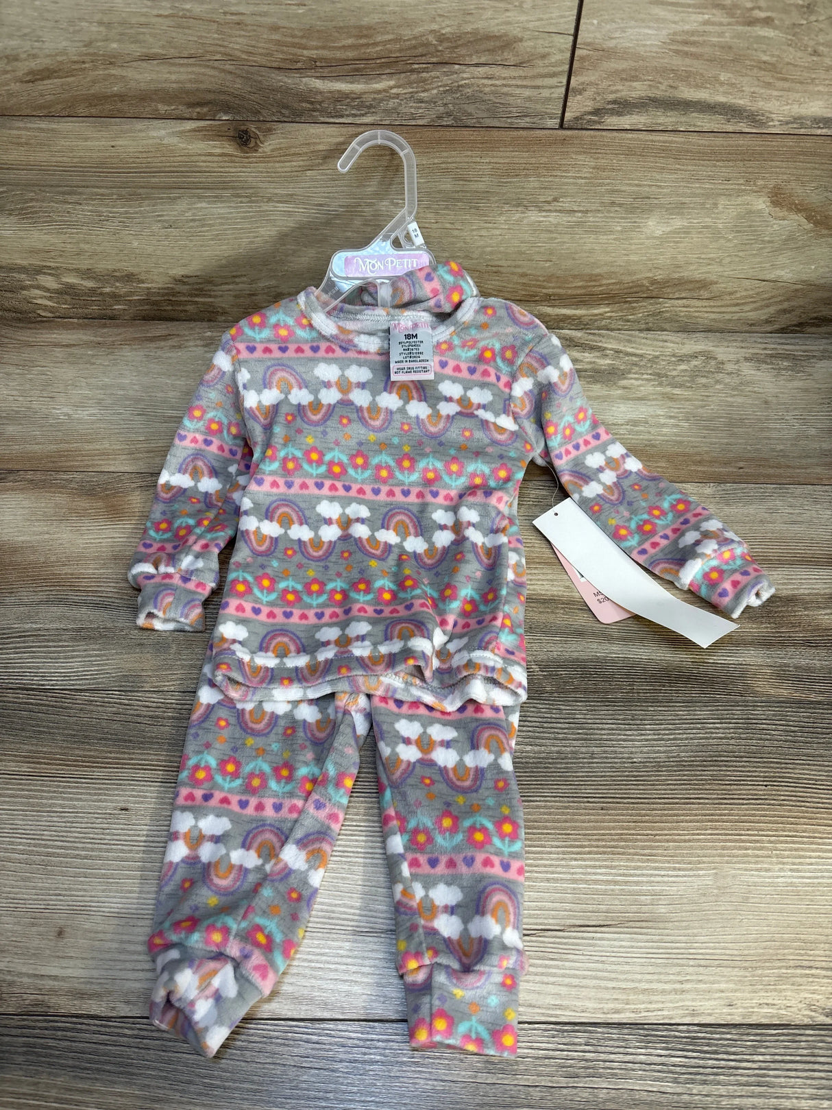 Toddler fleece pajama set with rainbow and flower print, long sleeves and pants, size 18M