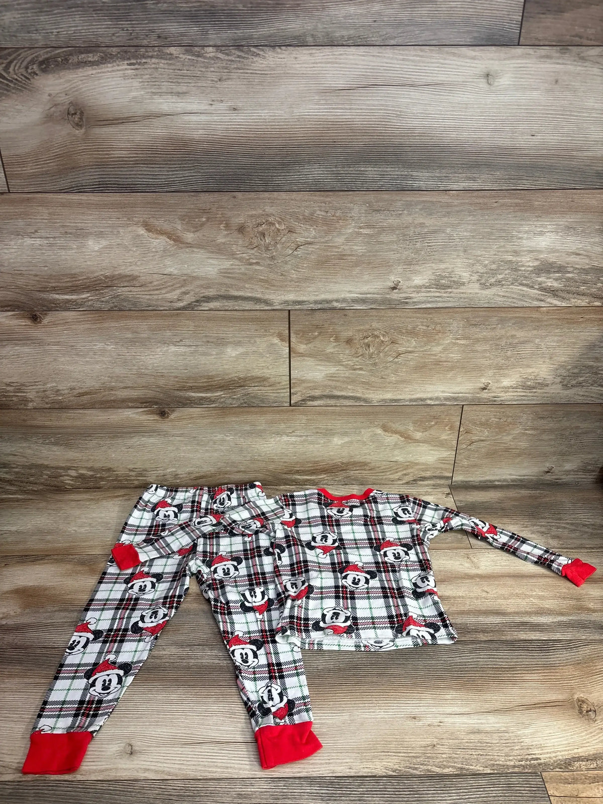 Mickey Mouse Christmas pajamas set with plaid print and red cuffs, kids holiday sleepwear