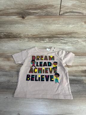 Beige toddler t-shirt with colorful letters saying Dream Lead Achieve Believe and three cartoon kids, kids clothing