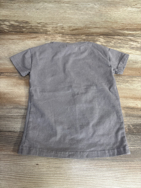 Plain gray short-sleeve toddler t-shirt laid flat on wooden surface, kids resale clothing