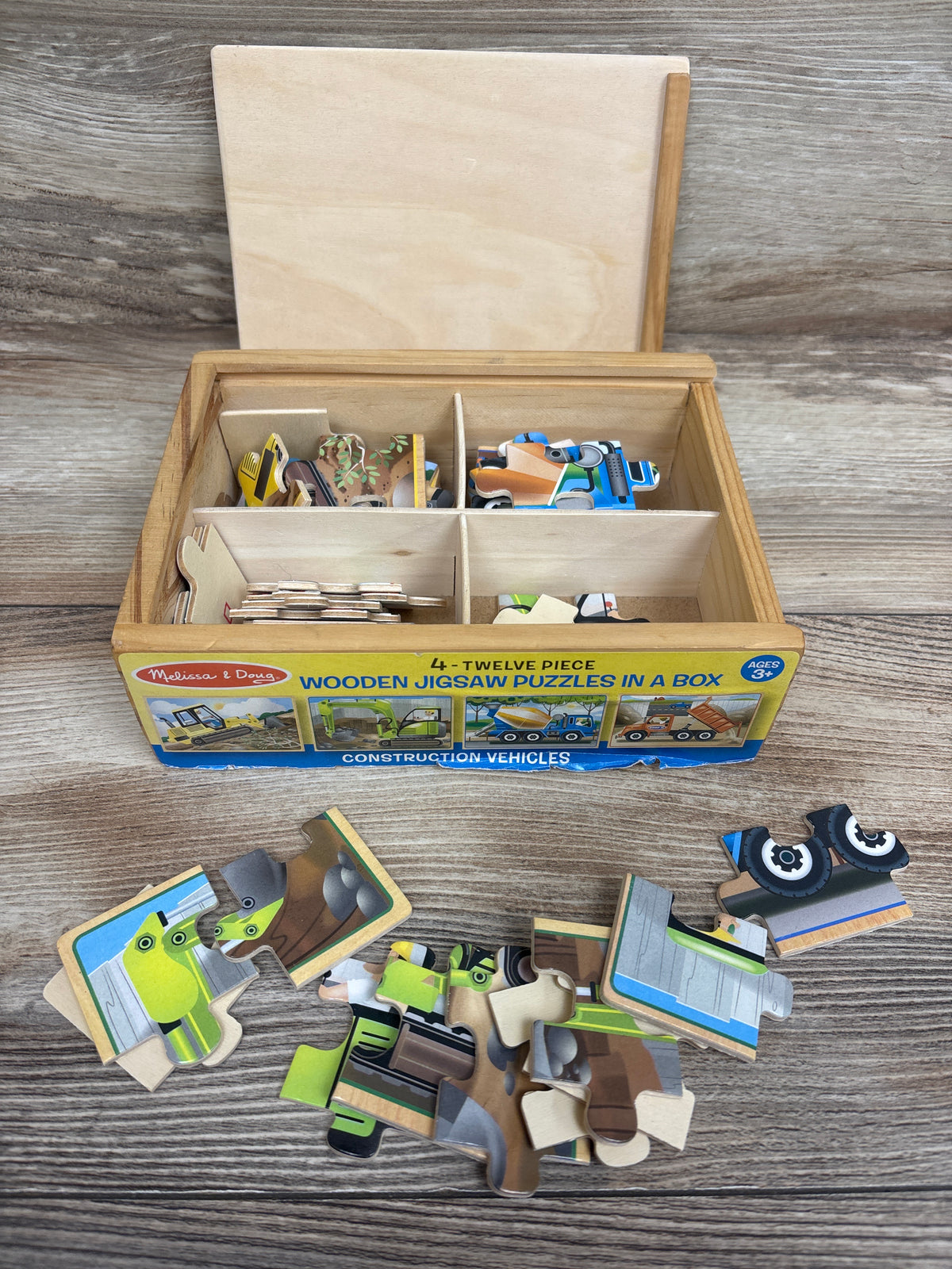 Melissa & Doug Construction Vehicles 4-in-1 Wooden Jigsaw Puzzles in a Box
