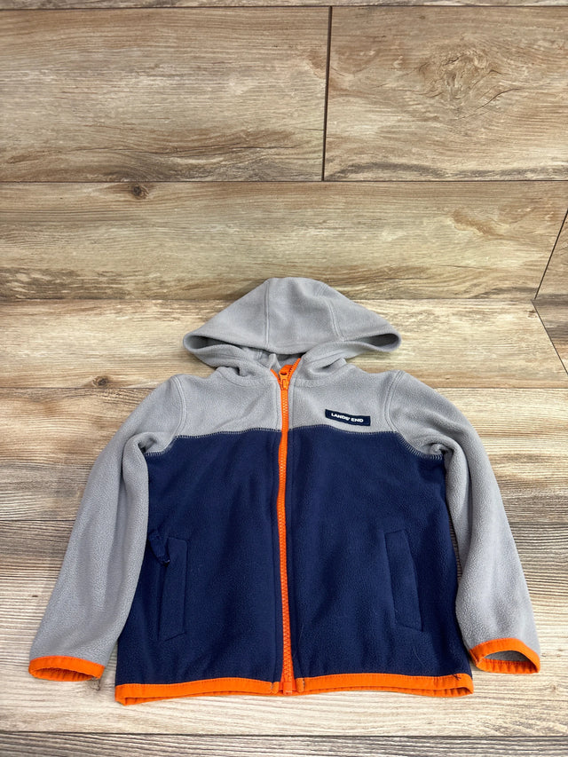 Front view of Lands End full zip fleece jacket showcasing gray and navy color blocking, hood and orange zipper on wood flooring