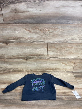 Navy blue kids sweatshirt with Black Panther graphic and long sleeves, laid on wood floor