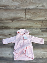 Front view of pink Le Petit Elephant hooded baby bathrobe showcasing attached hood with elephant ears and matching belt on wood floor background